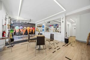 a dining room with a table and chairs at Lake Drive apartment in Georgina