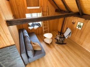 an overhead view of a living room in a cabin at Traditional Cabin with Sea View in Stykkið