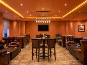 a conference room with a table and chairs at Fun & Sun Naama Waves in Sharm El Sheikh