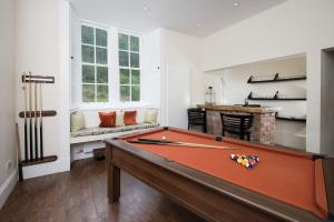 a living room with a pool table in it at Stuckgowan in Arrochar