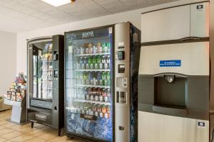 a soda machine in a store with drinks in it at Motel 6-New Stanton, PA in New Stanton