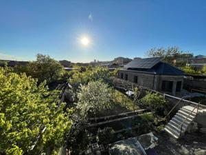 an overhead view of a garden with a house at MM House in Yerevan