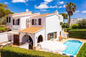 an aerial view of a villa with a swimming pool at Villa Ponent in Port d'Addaia