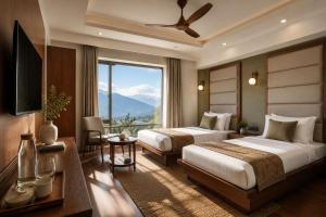 a hotel room with two beds and a large window at Hotel Grand Kings Premium in New Delhi