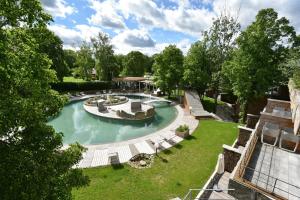 an aerial view of a swimming pool in a park at Mawell Resort in Langenburg