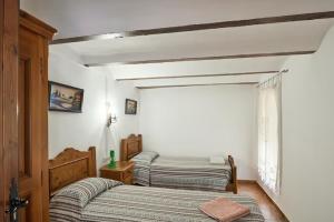 a bedroom with two beds in a room at VTAR CASILLA MIGUELIN in Montilla +21 photos