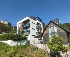 a house on top of a hill at Boutique Hotel Sleep and Wine in Batumi