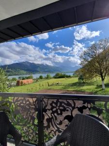 a view from a balcony with a view of a field at Plav`s dream in Plav