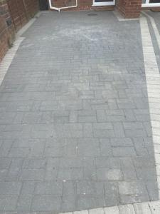 a brick walkway in front of a building at Holyport Studio flat in Bray +2 photos
