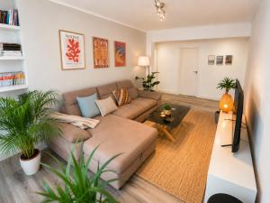 a living room with a couch and a table at Hauda in Sopelana