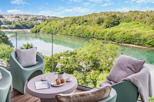 a balcony with a view of a river at 3 Bed in Looe oc-a29455 in Looe