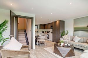 a living room with a couch and a table at 3 Bed in Looe oc-a29455 in Looe