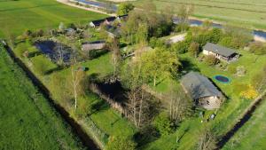 an aerial view of a house in a field at Safaritent Zilverreiger in Lettelbert