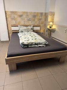 a bed in a room with a mattressitures at Ferienhaus Seilerbahn 17 in Vallendar