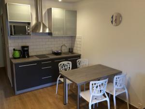Kuchyňa alebo kuchynka v ubytovaní Apartamenty Villa Baltic Sun II i III