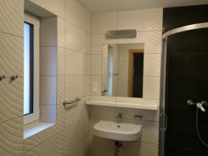 Kúpeľňa v ubytovaní Apartamenty Villa Baltic Sun II i III