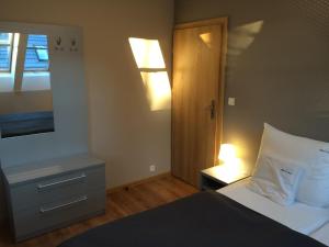 Posteľ alebo postele v izbe v ubytovaní Apartamenty Villa Baltic Sun II i III