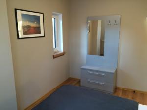 Posteľ alebo postele v izbe v ubytovaní Apartamenty Villa Baltic Sun II i III