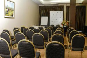 a conference room with chairs and a table and a whiteboard at Condado Hotel Casino Goya in Goya +42 photos