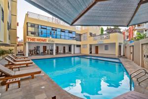 a large swimming pool in the middle of a building at Nyali luxe 1 bedroom in Nyali
