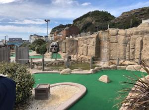 a miniature golf course with a skull in the background at Central location Sea view in Hastings