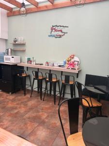 a large table in a room with chairs at Hostal Matta in Antofagasta
