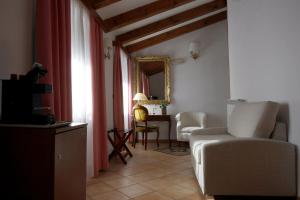 Posezení v ubytování Albergo Al Viale