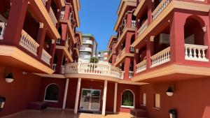 a view of a building with balconies at Estudios Costavigía Mazagón by Ramona in Mazagón