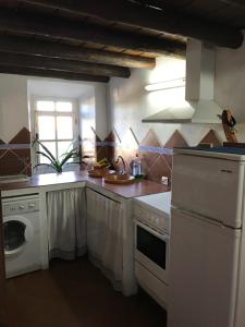 Kuchyň nebo kuchyňský kout v ubytování Cortijo Viña del Duco
