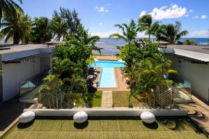 an aerial view of a resort with a swimming pool at Plage Bleue D2 in Trou aux Biches