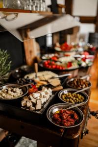 a buffet with many different types of food on a table at Gästehaus 22 am Klostergarten in Rehna