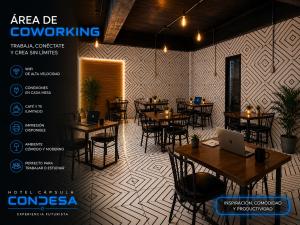 a restaurant with tables and chairs with a laptop at Hotel Capsula Condesa in Mexico City