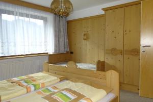 Postel nebo postele na pokoji v ubytování Haus Bergfried
