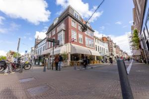 a building on a street in a city at EL HOTEL - The Hague in The Hague