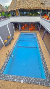 an overhead view of a swimming pool at a resort at 7G Residency Bwejuu in Bwejuu +7 photos