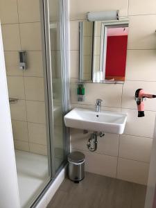 Koupelna v ubytování Meister BÄR HOTEL Am Wald + 22 fotografií