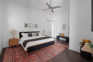 a bedroom with a large bed and a rug at Million Dollar Fireworks View no 412 in Dallas