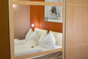 Postel nebo postele na pokoji v ubytování Hotel Stadtkrug