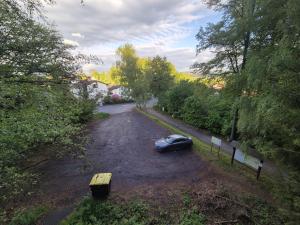 a car parked on the side of a road at FeWo im Forsthaus in Marktredwitz