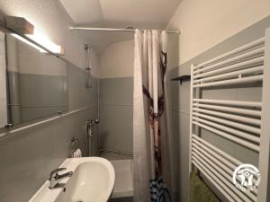 a bathroom with a sink and a mirror at Gîte de séjour La Dressère in Formiguères +31 photos