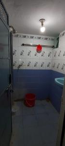 a bathroom with a sink and a toilet at Shri chitrakoot homestay in Chitrakoot