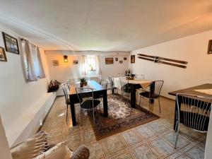 a dining room with a table and chairs at DW Bukówka in Karpacz