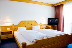 Postelja oz. postelje v sobi nastanitve Hotel Alpenfriede