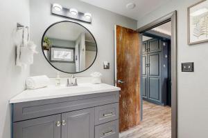 a bathroom with a sink and a mirror at Wishing Wells in Wells +32 photos