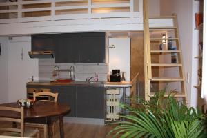 Una cocina o kitchenette en Le Clos Beaufleury