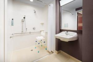 a bathroom with a sink and a shower at Courtyard by Marriott New York Manhattan Upper East Side in New York