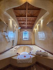 a bathroom with a shower and a sink in a room at Riad Chbanate in Essaouira +118 photos