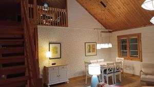 a room with a table and a dining room at Quinta de Argos in Cehegín