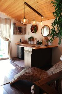 a kitchen with a large island in a room at Sunny's Suite in Safed