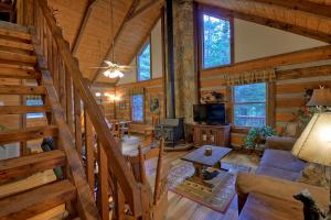 an overhead view of a living room in a log cabin at Mountain Retreat in Morganton +19 photos